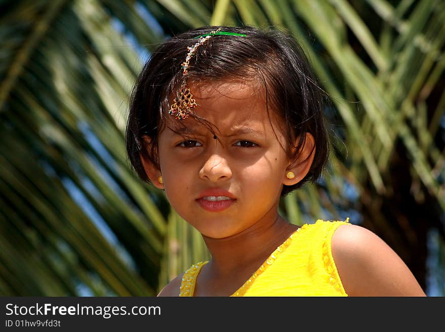 A face of a girl showing her awkwardness and uncomfortable posture. A face of a girl showing her awkwardness and uncomfortable posture.