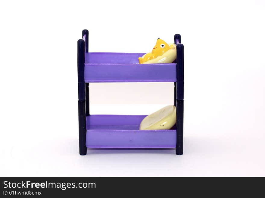 A toy set of plastic bunk beds