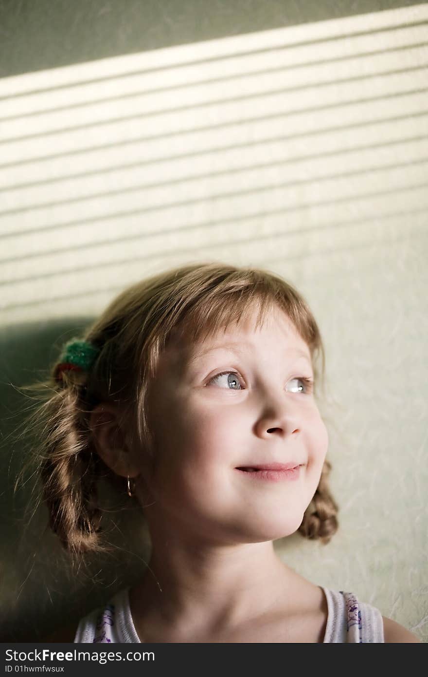 Stock photo: an image of a funny smiling girl. Stock photo: an image of a funny smiling girl