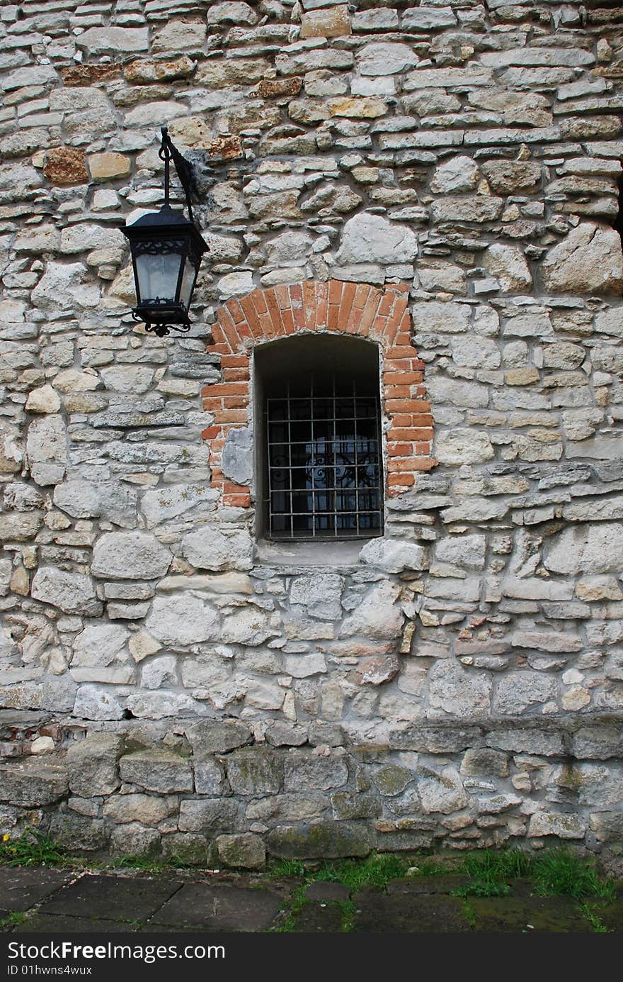 Ancient lantern on a wall