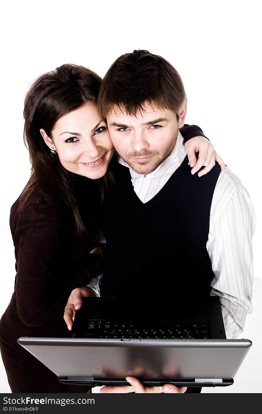 Stock photo: an image of man and woman with black laptop. Stock photo: an image of man and woman with black laptop