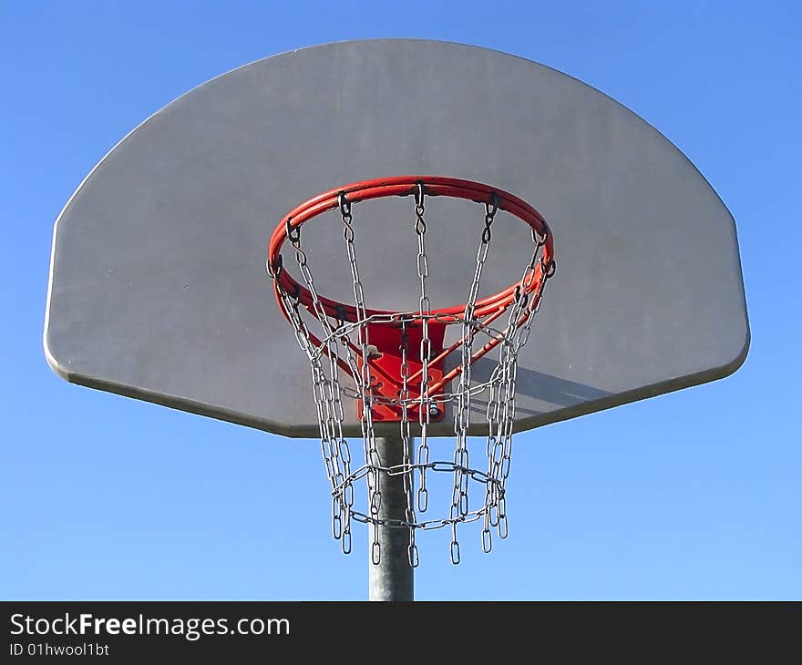 Basketball board under blue sky. Basketball board under blue sky.