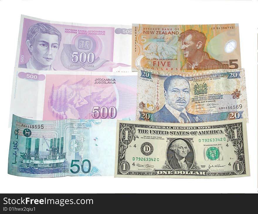 A photo of multiple country currency such as Malaysian Ringgit US Dollar New Zealand 5 Dinara 500 and Kenya's 20 shillings. A photo of multiple country currency such as Malaysian Ringgit US Dollar New Zealand 5 Dinara 500 and Kenya's 20 shillings.