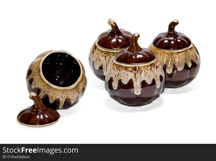 Brown clay pots on a white background