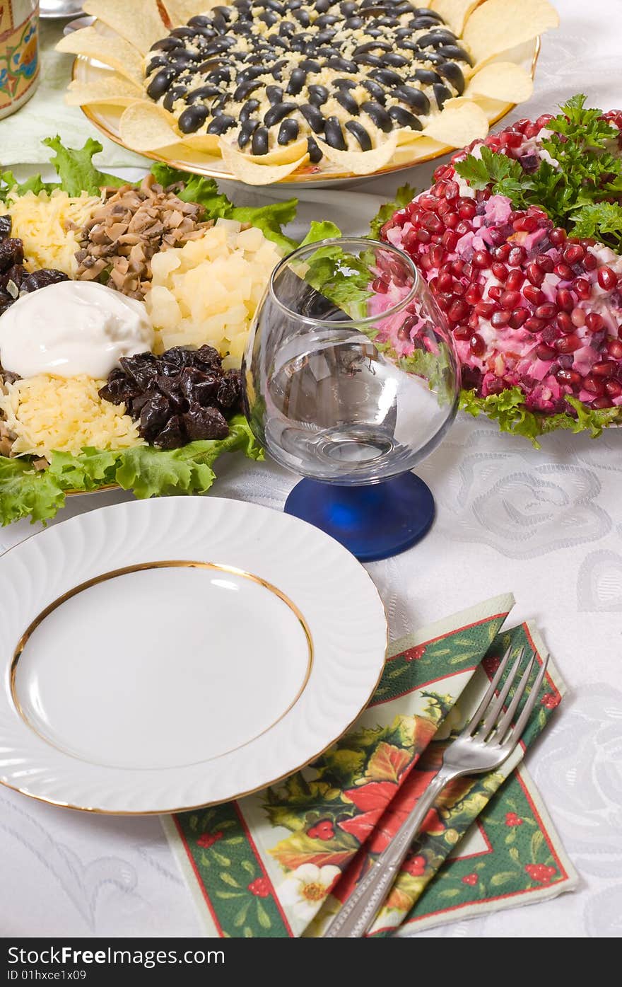 Different Salads And Wine Glass.