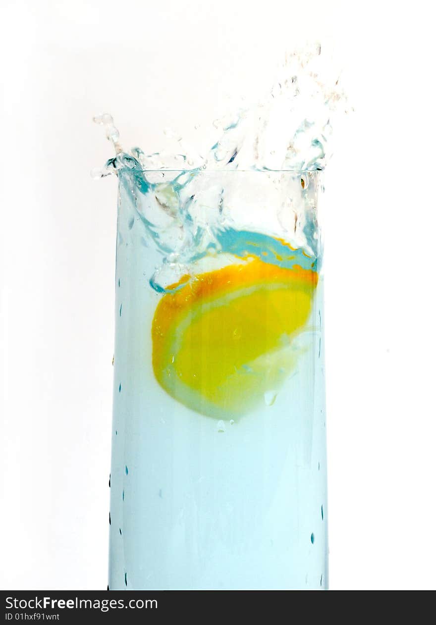 Lemon Splashing Into Glass