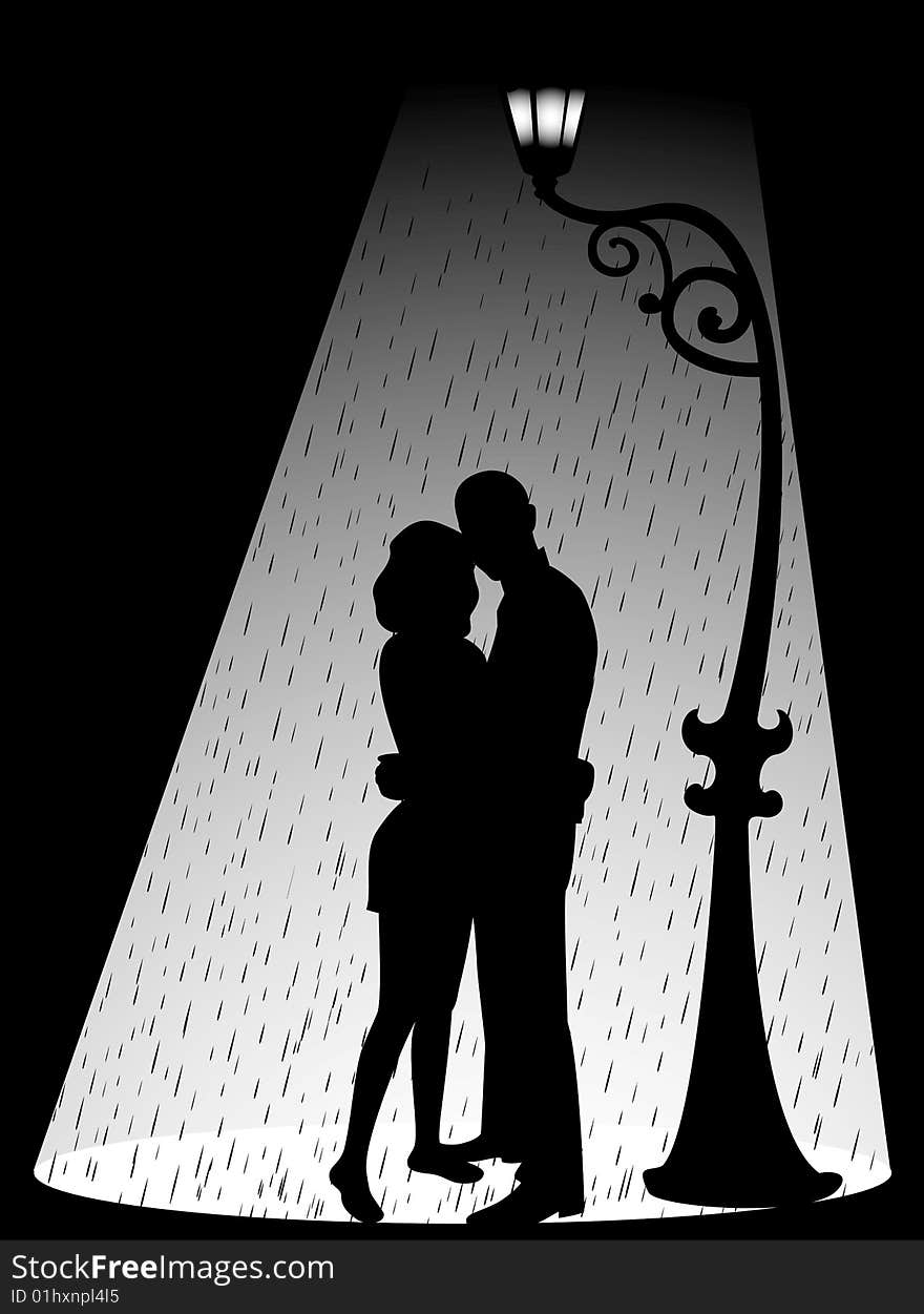 Silhouette of two lovers in the rain