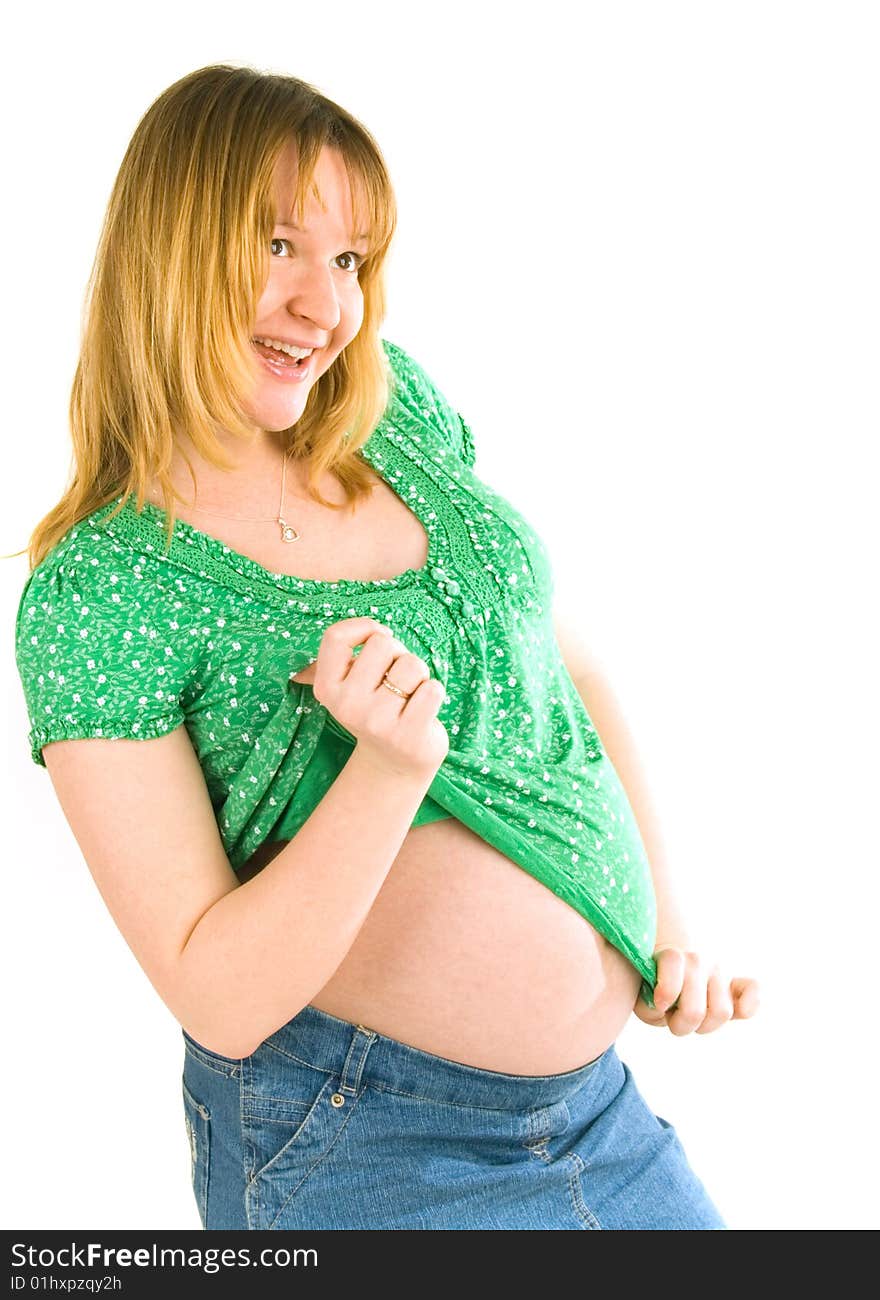 Young pregnant smiling woman on white