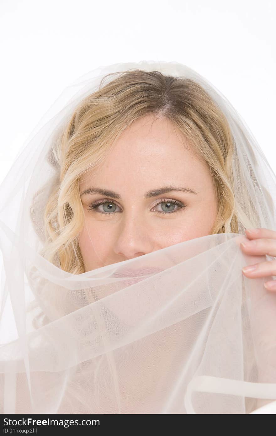 Studio shot of a bride isolated on white background