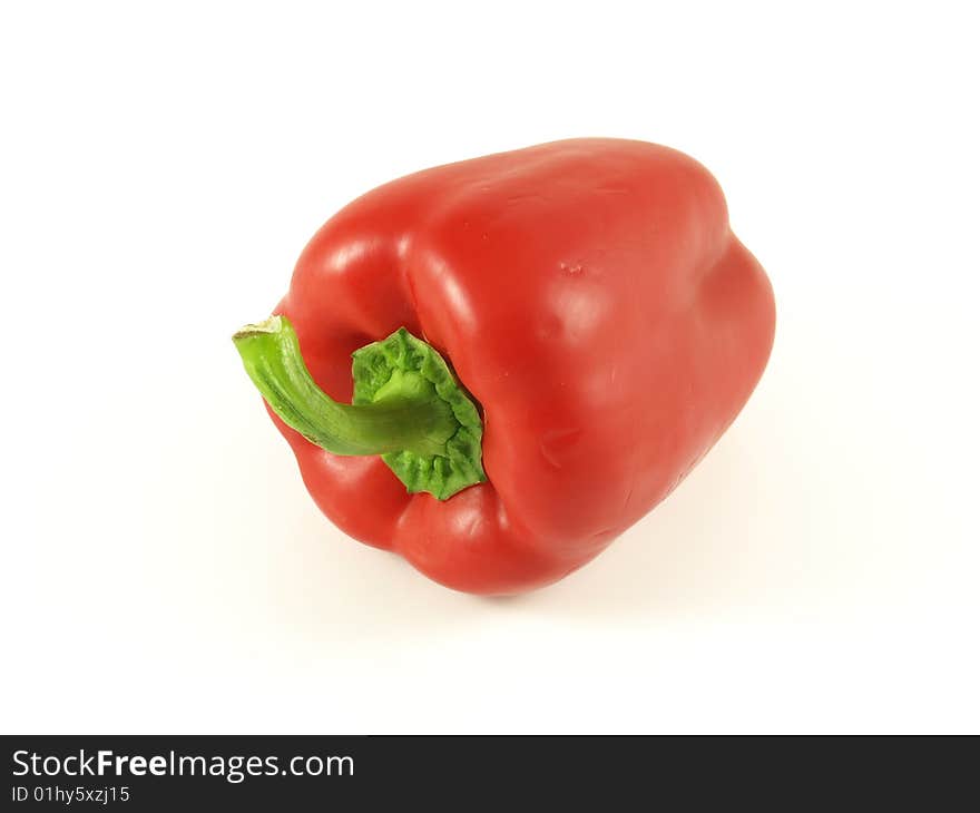 Red pepper on white isolated background.