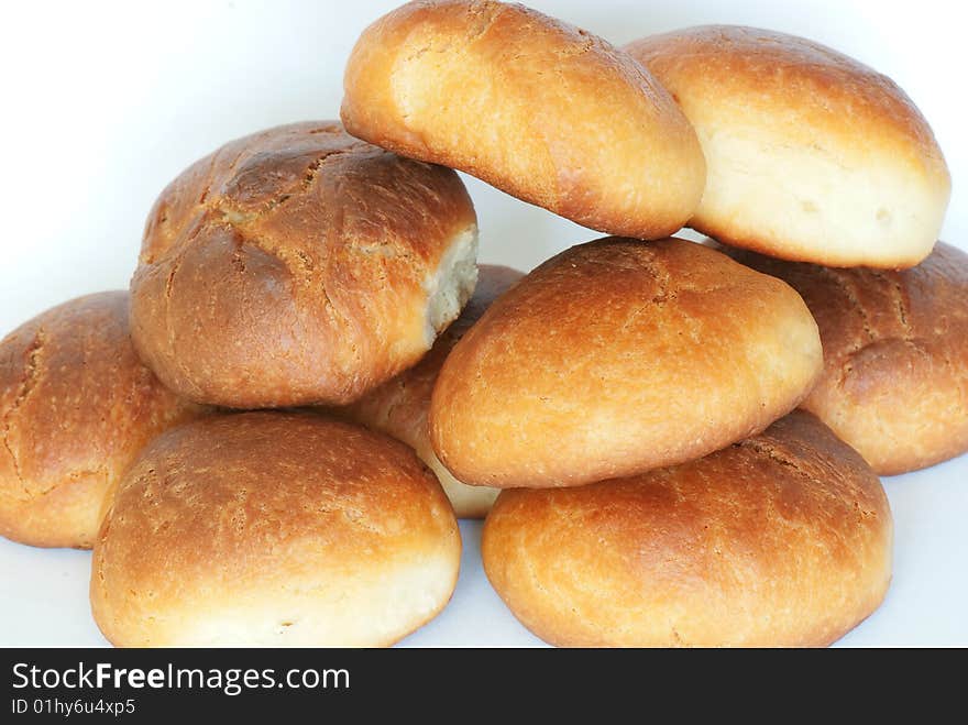 Fresh small bread on a light background. Fresh small bread on a light background