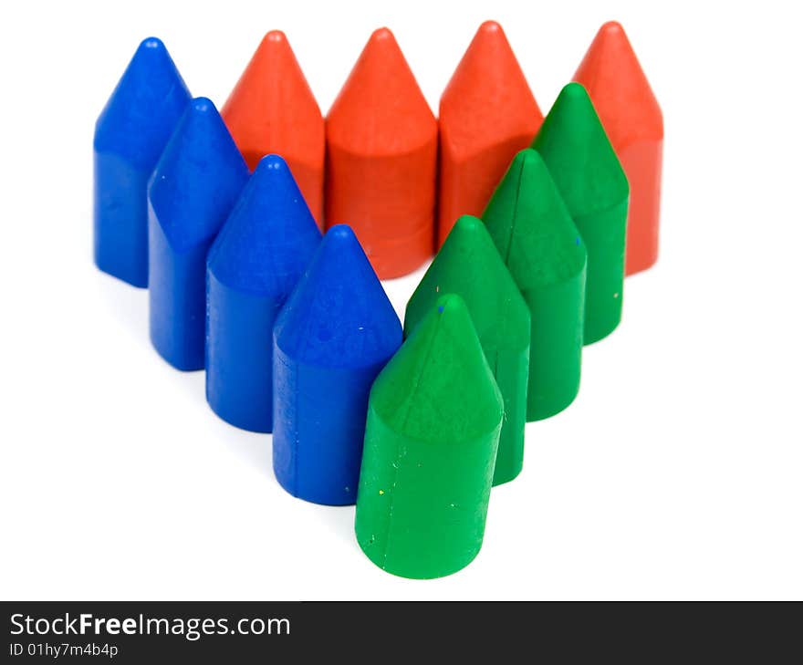 Triangle from red. blue and green wax pencils. Triangle from red. blue and green wax pencils