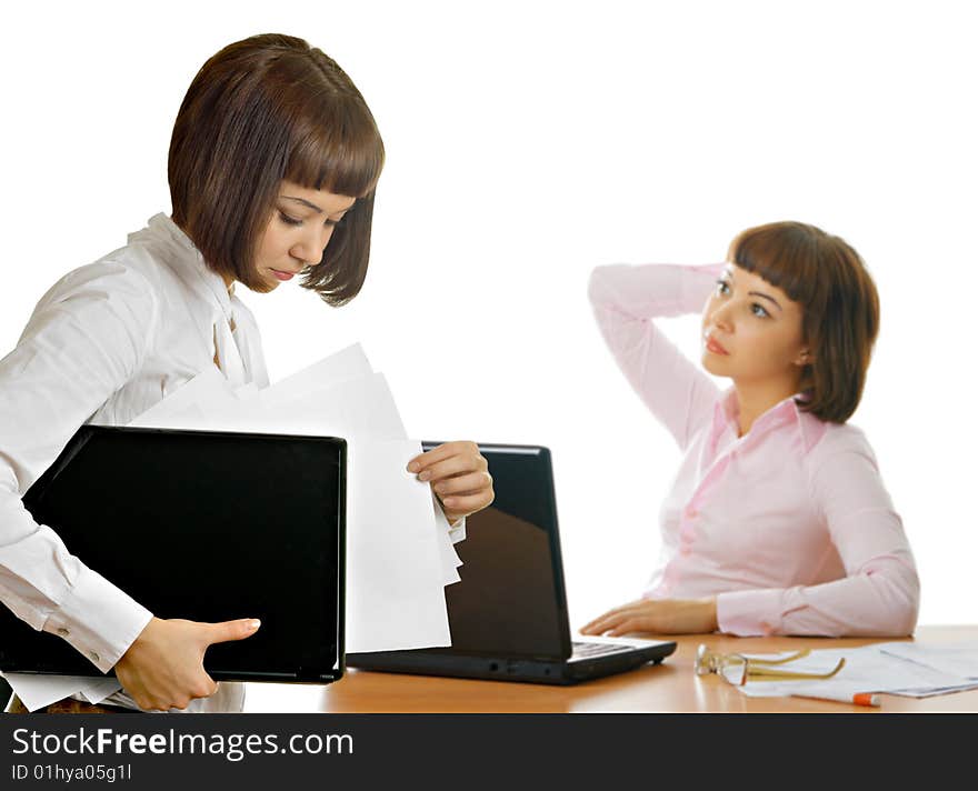 Young girls are actively working in the office