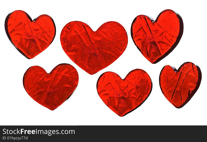 Red sweet transparent hearts isolated on white