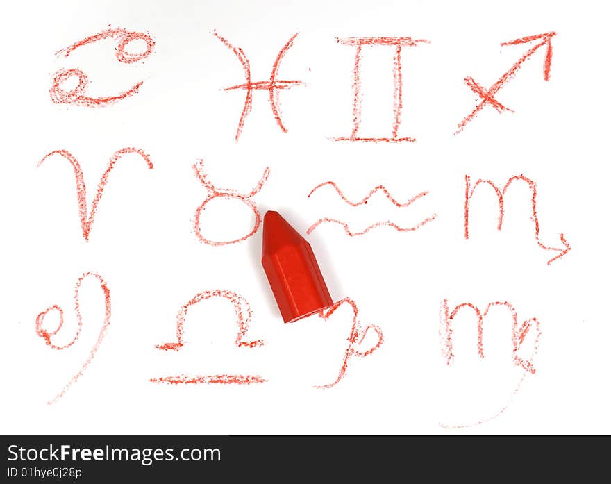 Zodiac signs with red wax crayon on white