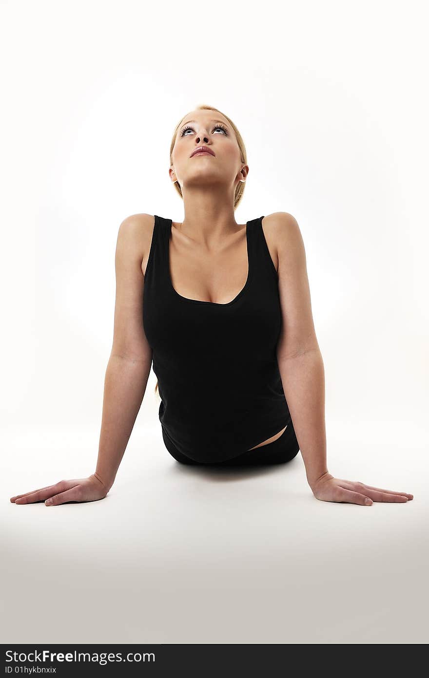 Young woman is doing an expert yoga exercise