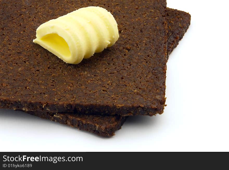 Bread and butter on a white background. Bread and butter on a white background