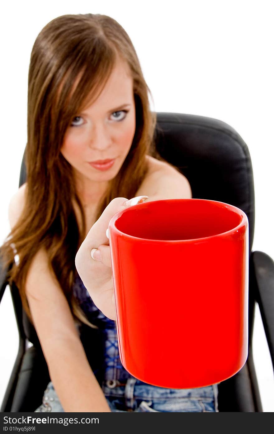 Front view of young woman offering drink on an isolated white background