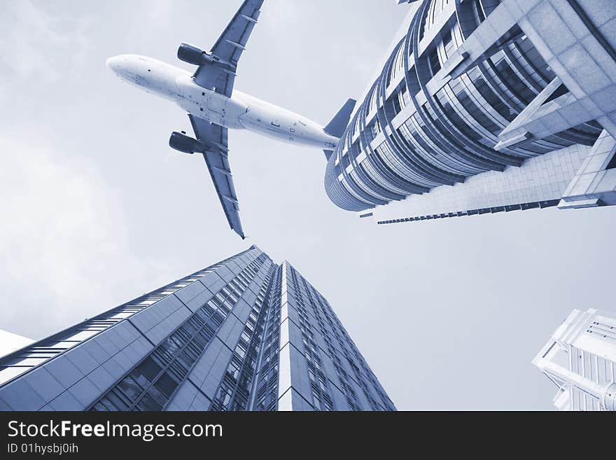 Airplane on the top of modern building.