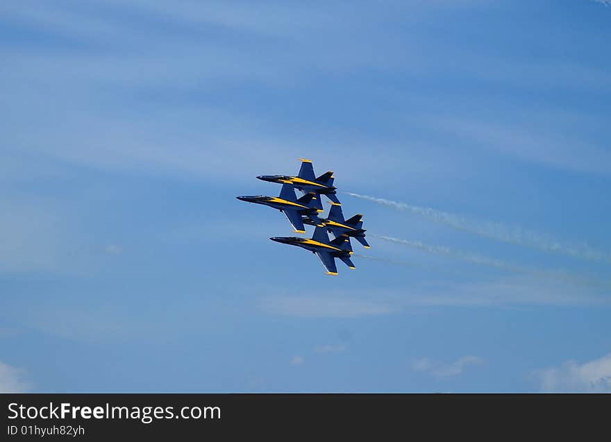 Blue Angels flying in tight Diamond formation