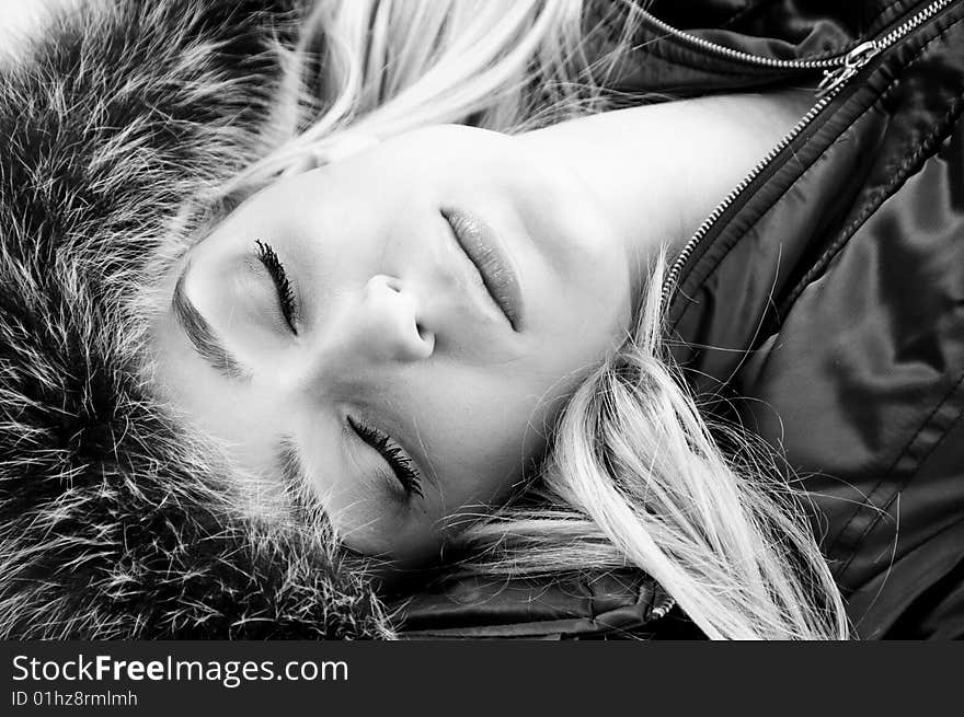 Beautiful face of woman with closed eyes