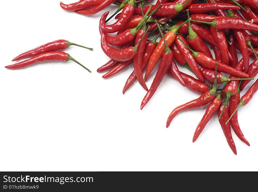 Hot red chili peppers, isolated on white background