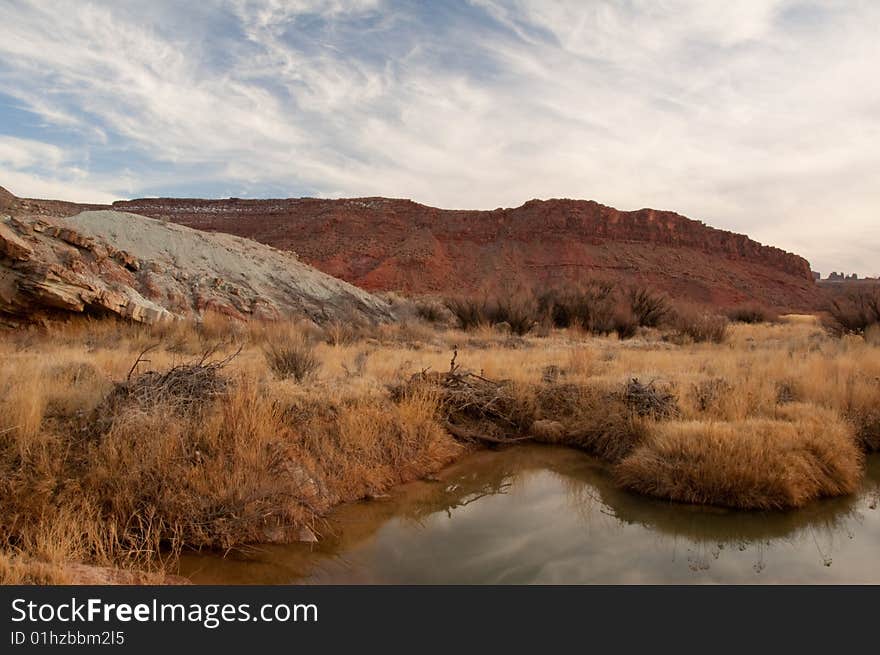 Desert landscape under bright blue sky. Desert landscape under bright blue sky