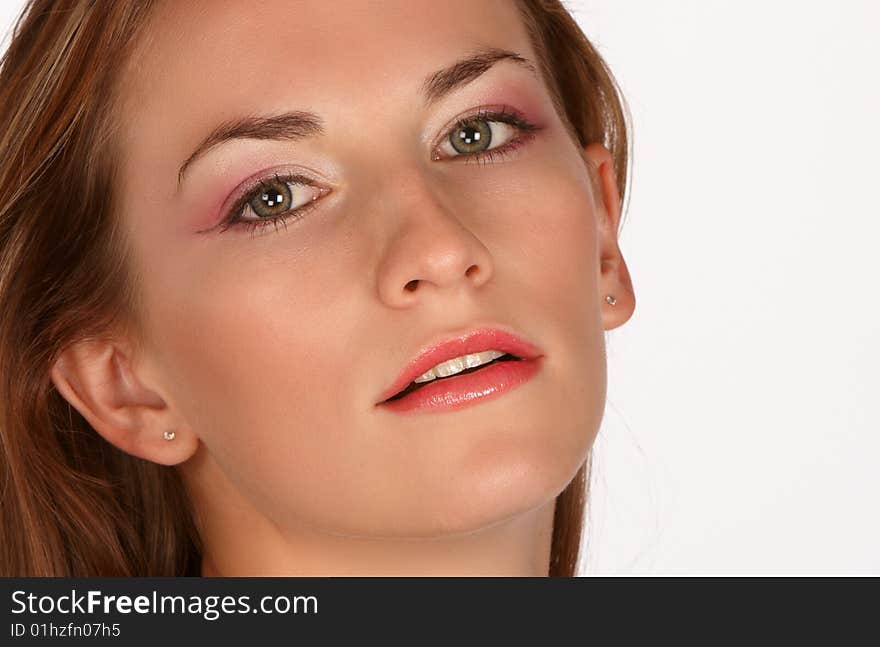 Brunette with long hair and pink eye shadow