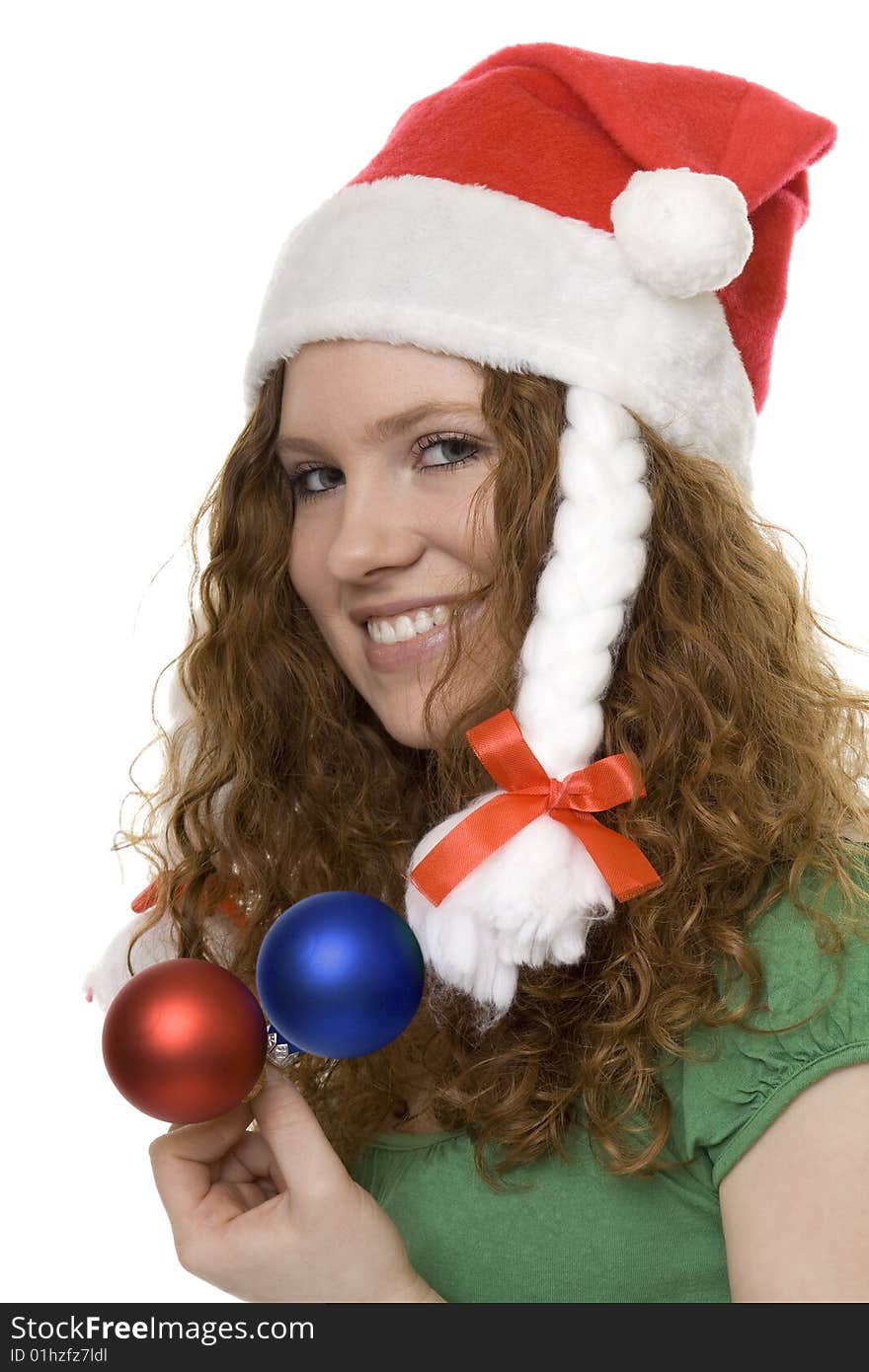 Christmas, red haired teenager with decoration, Christmas tree ball and Christmas hood