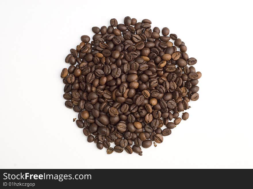 Roasted coffee beans on white background.