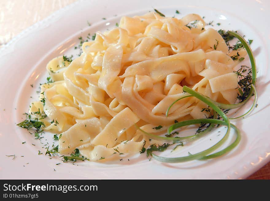 Noodles on a white plate