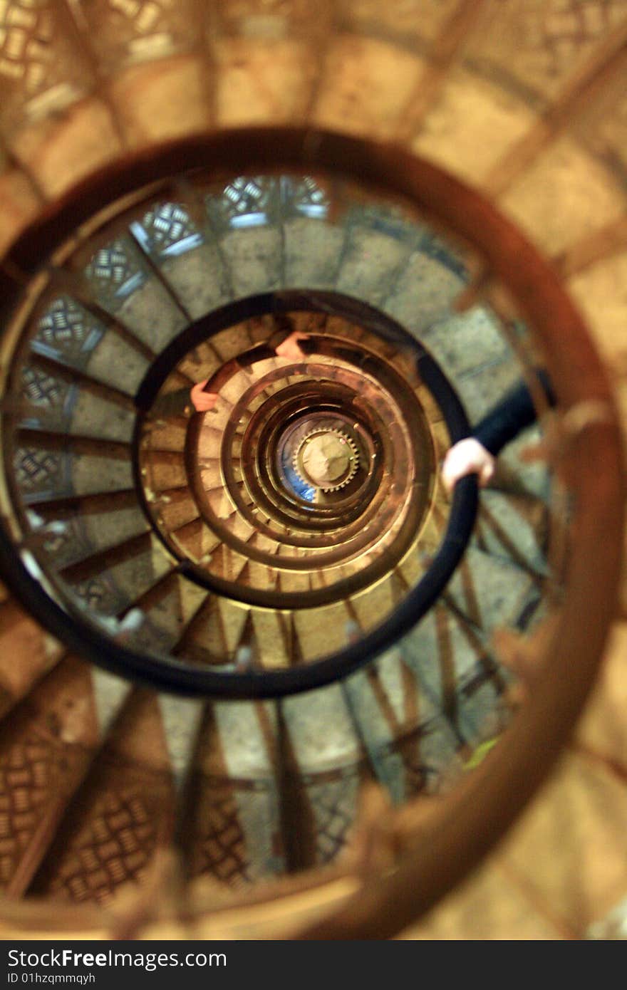 A deep spiral staircase in Paris. A deep spiral staircase in Paris