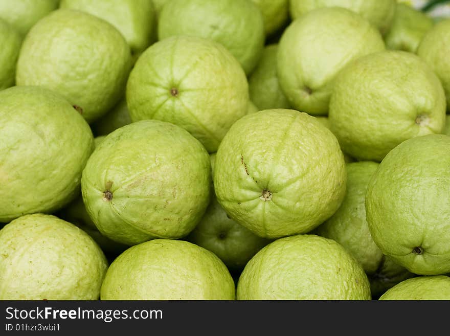 Guavas on a market stall in Asia.