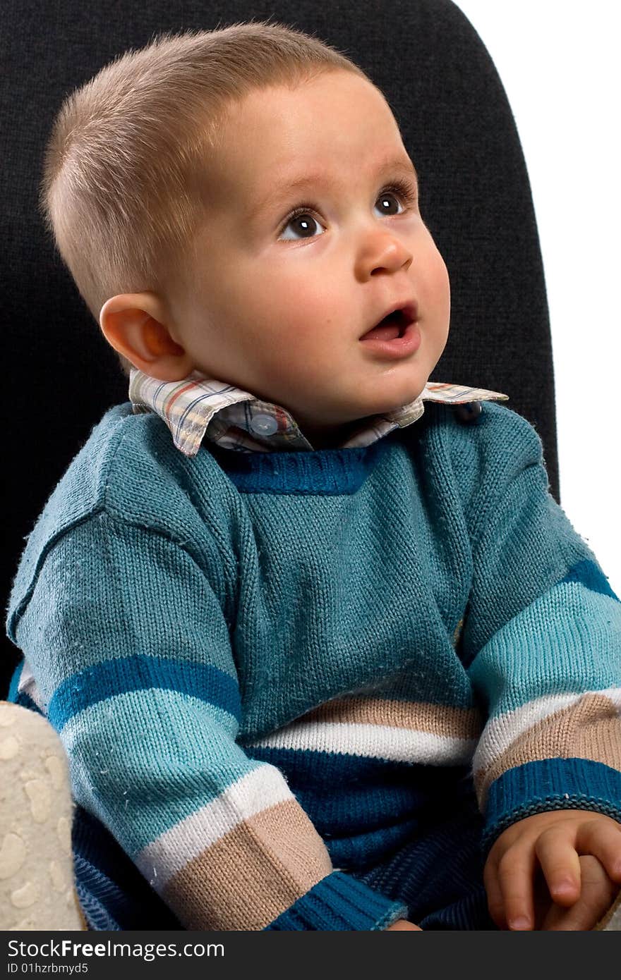 Sitting smile young boy