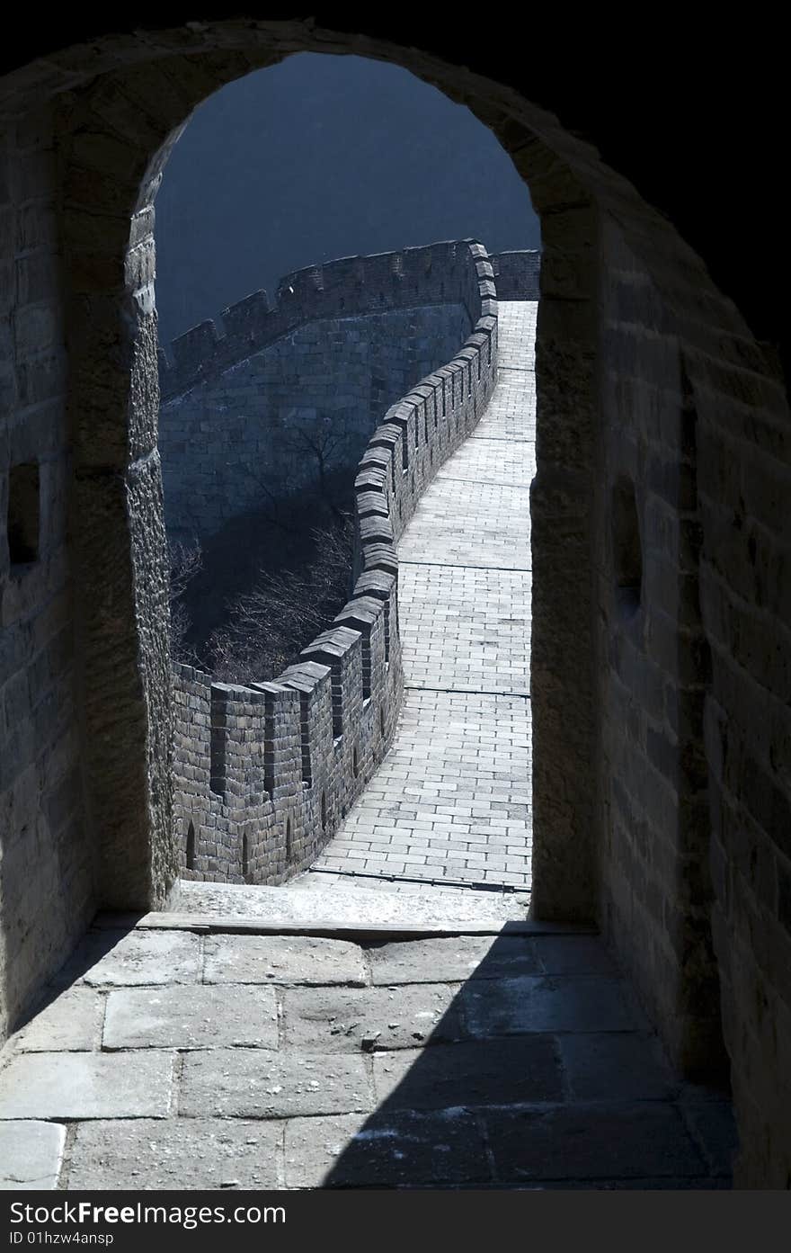 Detail of the Great Chinese Wall - looking out from one of the gates. Detail of the Great Chinese Wall - looking out from one of the gates