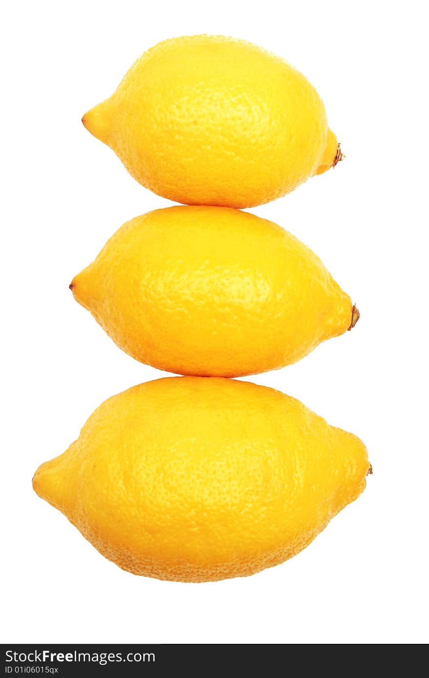 Stack of lemons isolated on white. Stack of lemons isolated on white.