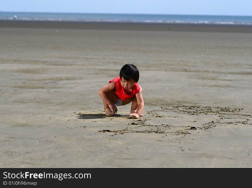 Child by the sea