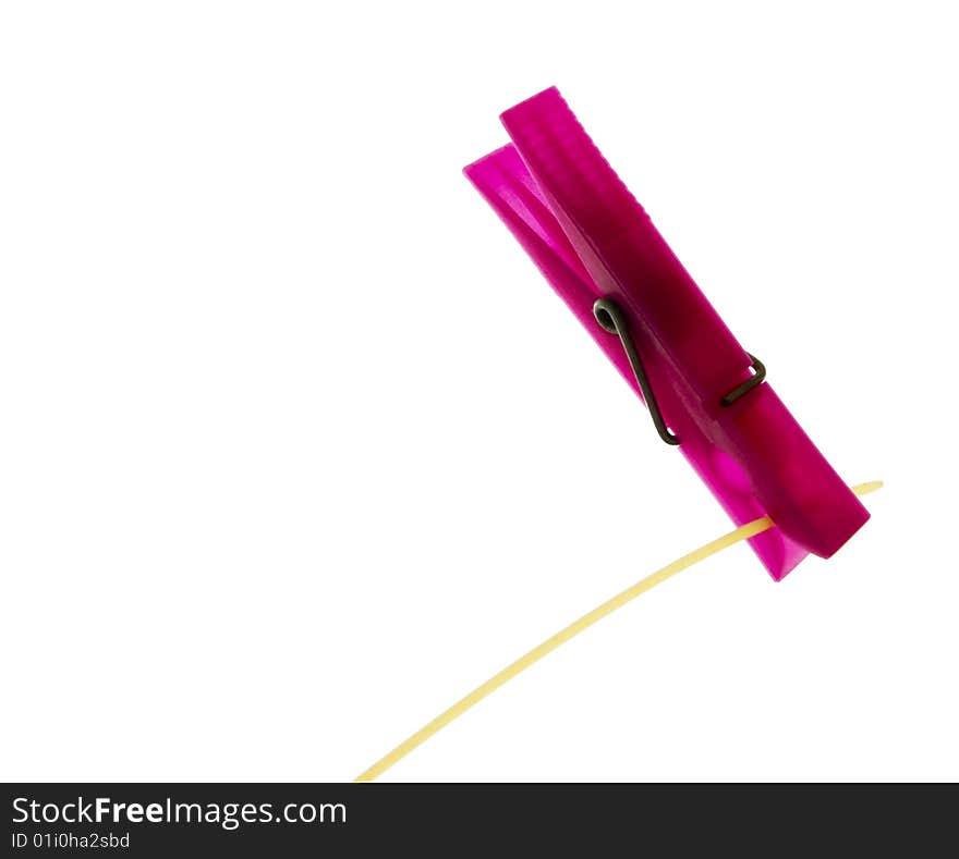 A clip of spaghetti in a pink