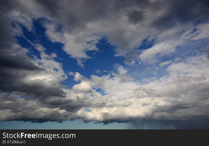 Cloudy sky after a summer storm. Location: Italy. Cloudy sky after a summer storm. Location: Italy