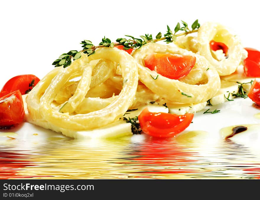 Salad with Calamari Rings, Sheep Cheese and Tomato. Isolated on White Background. Salad with Calamari Rings, Sheep Cheese and Tomato. Isolated on White Background