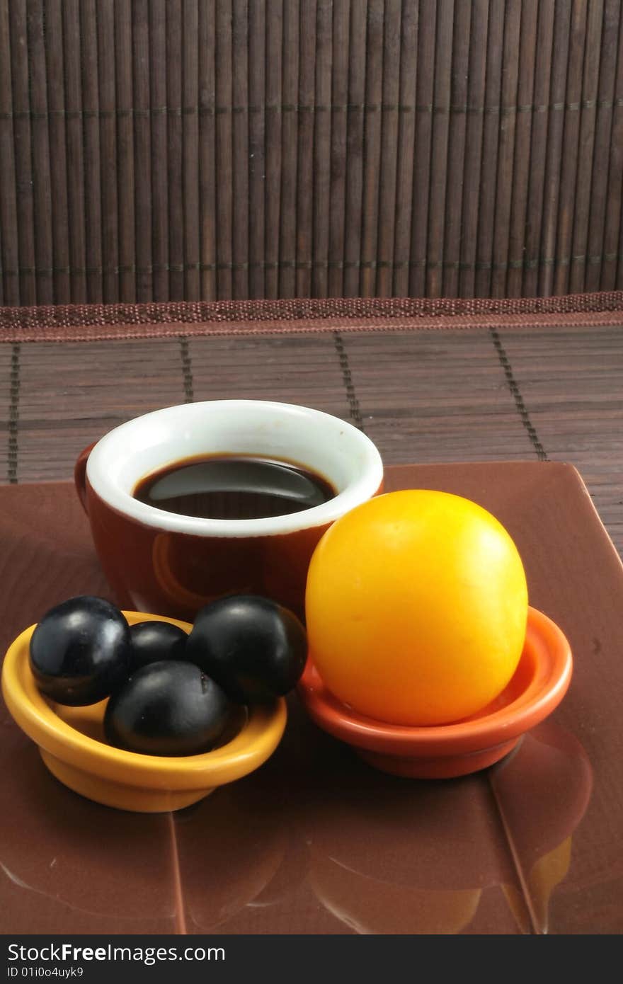 Breakfast with a coffee accompanied with fruits