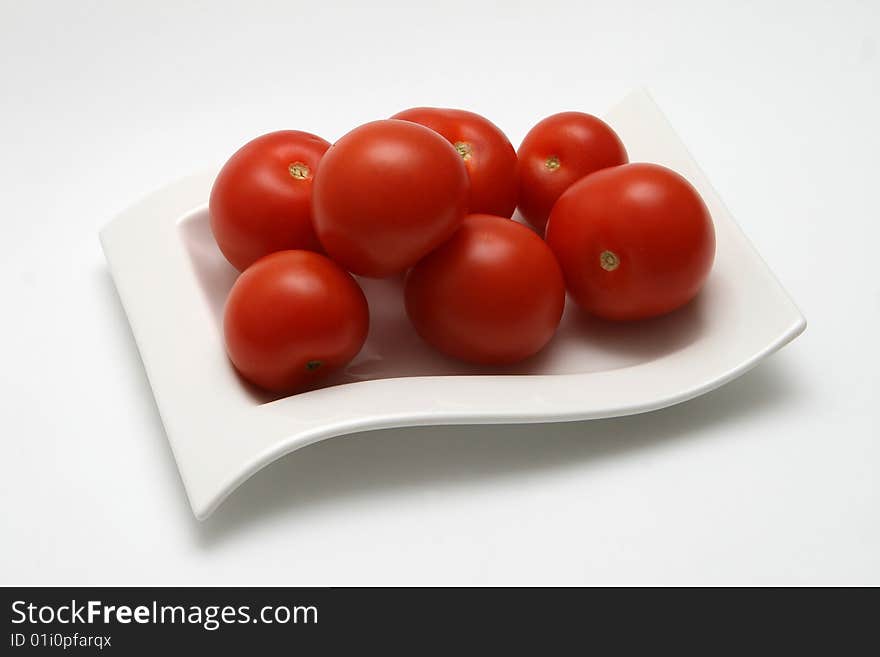 Tomatoes on saucer