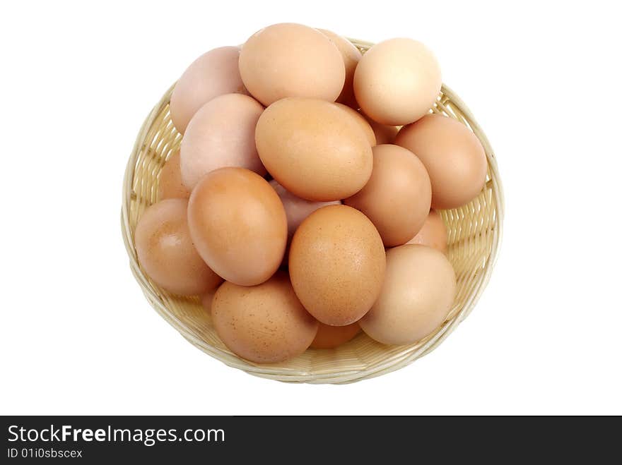 Brown eggs in basket.