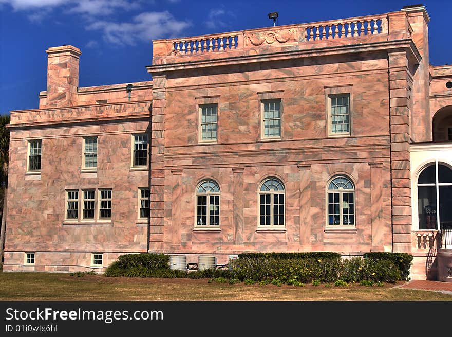 North wing of Charles & Edith Ringling's winter retreat, showing beautiful color of marble construction.  This building now houses administrative offices for New College of Florida. North wing of Charles & Edith Ringling's winter retreat, showing beautiful color of marble construction.  This building now houses administrative offices for New College of Florida