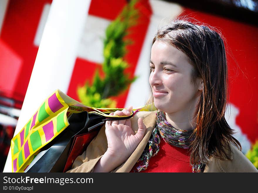 Smiling young woman shopping