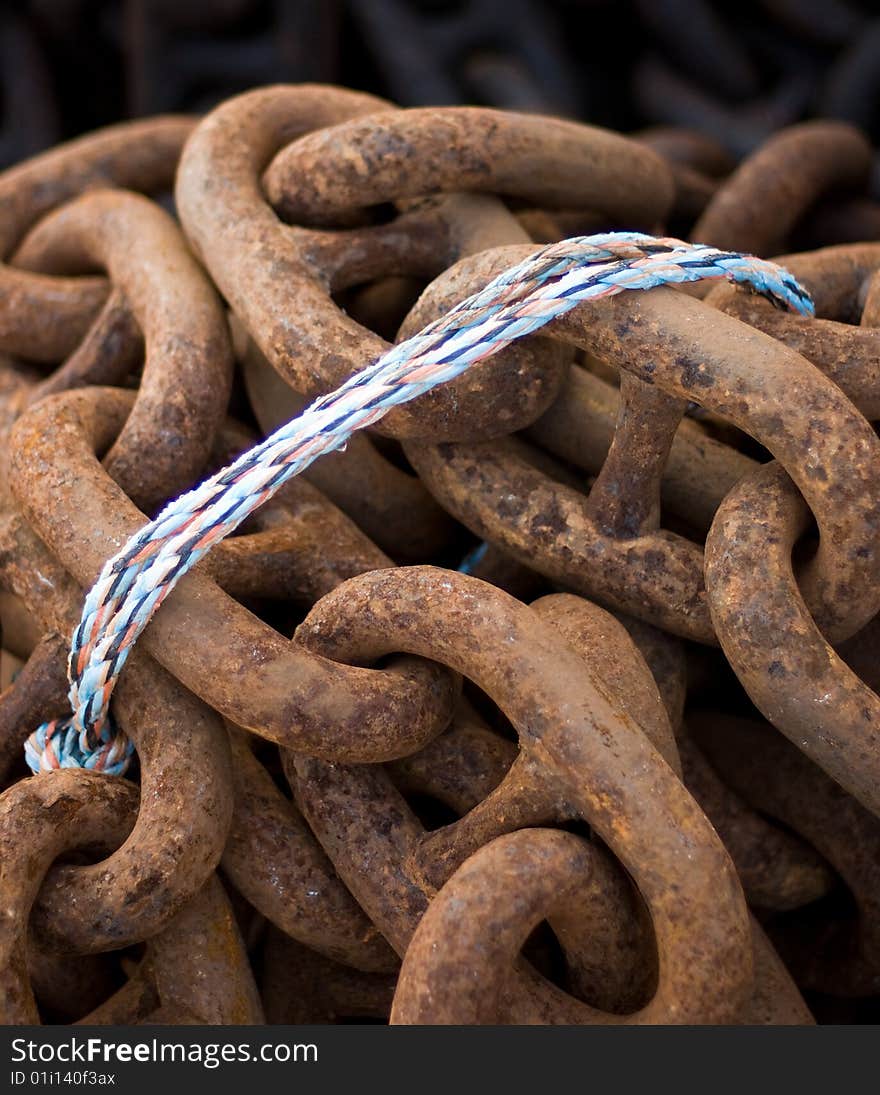 Rusty chains tied with string