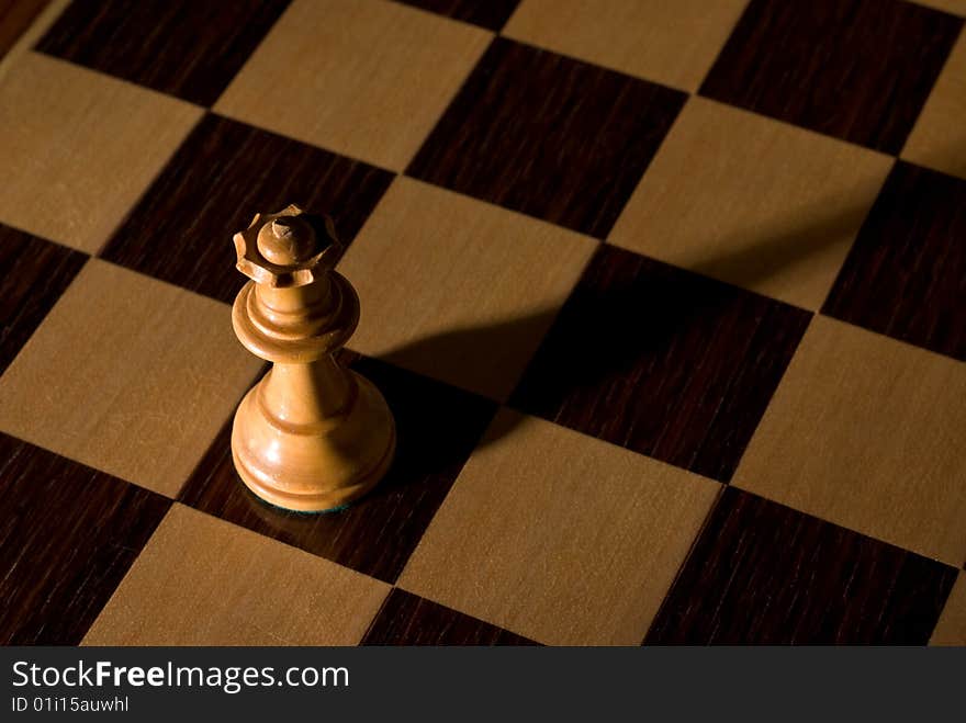 Chess board with piece as example of game or business concept for power, strategy or success. Chess board with piece as example of game or business concept for power, strategy or success