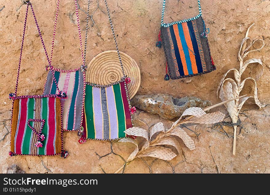 Ornamental striped bags on the wall. Ornamental striped bags on the wall