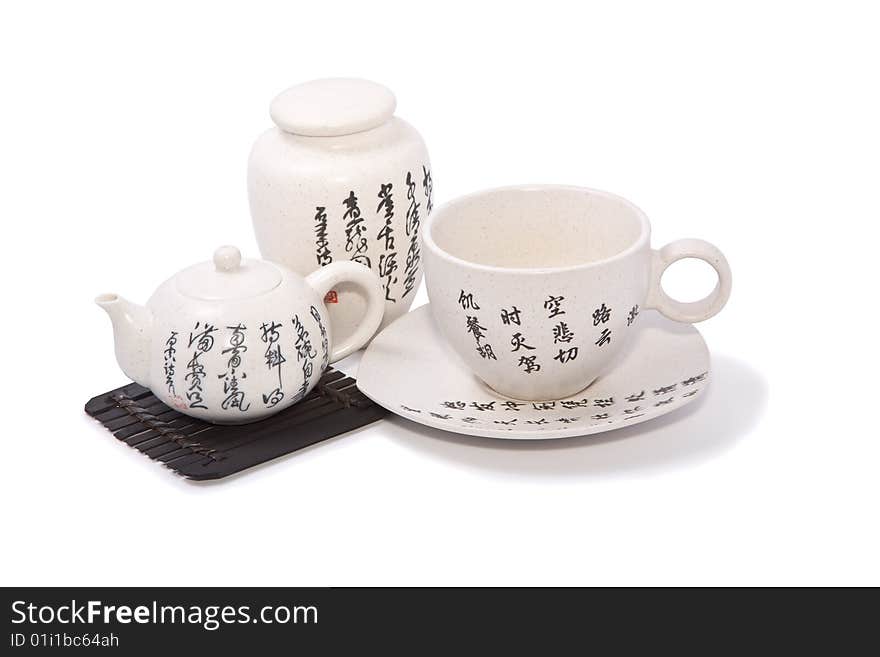 Tea-things in asian style with hieroglyphics