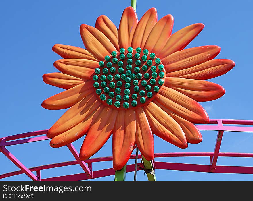 Image of a decorative detail on a thrill ride at the Strawberry festival in Plant City, FL. Image of a decorative detail on a thrill ride at the Strawberry festival in Plant City, FL.